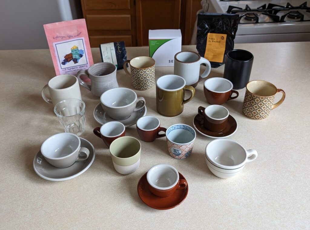 many coffee cups on the counter